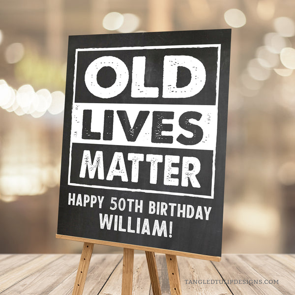 Customize this 50th Birthday Sign (or for any age!) with our 'Old Lives Matter' theme, perfect for honoring the guest of honor at any milestone! With a classic chalk white design against a timeless chalkboard background, this sign adds a personalized touch to a man's birthday decorations.