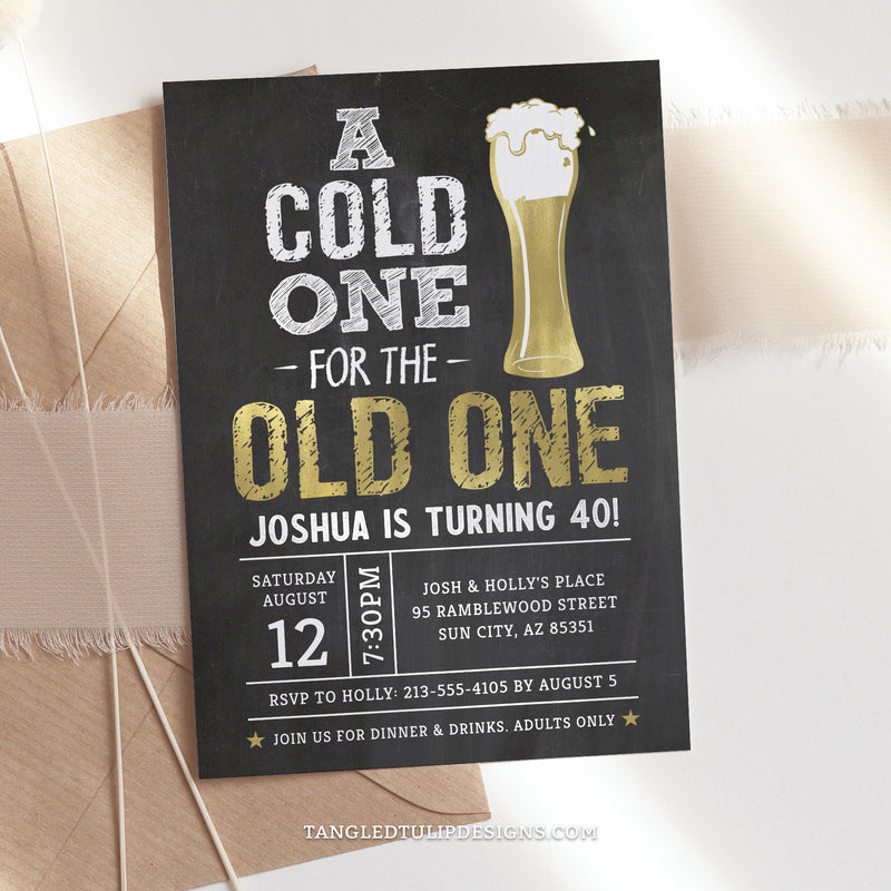 Have 'A Cold One for the Old One'! This chalkboard-style invitation, adorned with a shimmering gold beer, sets the perfect tone for a man's birthday bash. Perfect for a 40th birthday, or for any age. Tangled Tulip Designs - Birthday Invitations