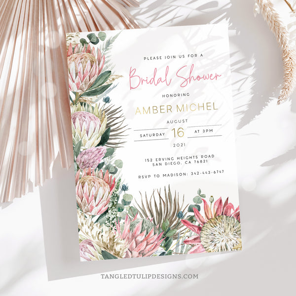 A Bridal Shower invitation in a pretty bohemian floral design with proteas and gold accents. By Tangled Tulip Designs.