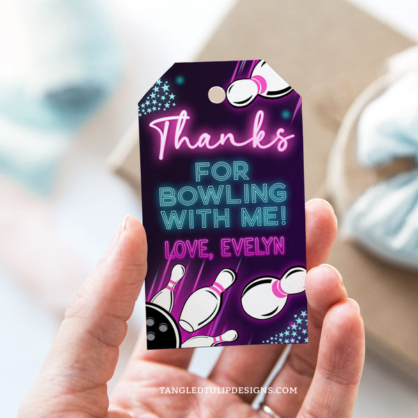 Bowling Party Thank You tag template for girls, in a neon glow design. This editable bowling party tag template features a bowling ball hitting pins for a strike.  Edit in Corjl. By Tangled Tulip Designs.