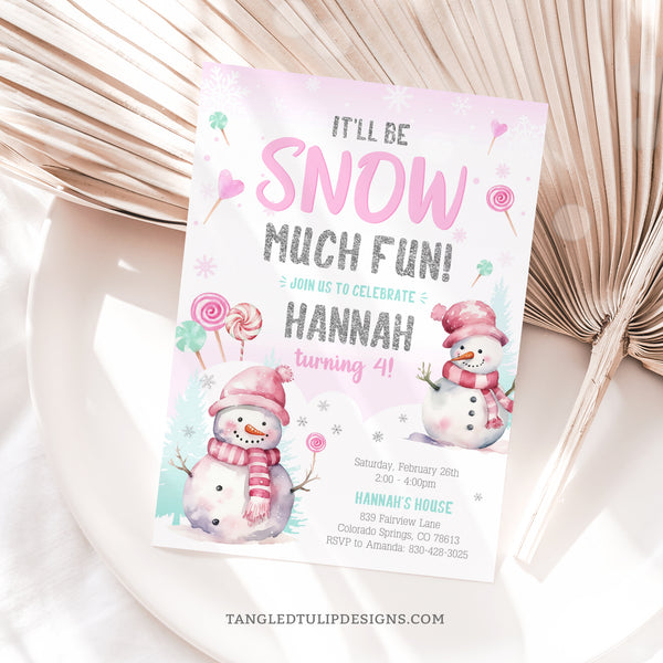 Winter Snow birthday invitation in pink, with a cute snowman and candy lollipops in the snow for a girl's birthday party, with glitter silver snowflakes. Tangled Tulip Designs - Birthday Invitations