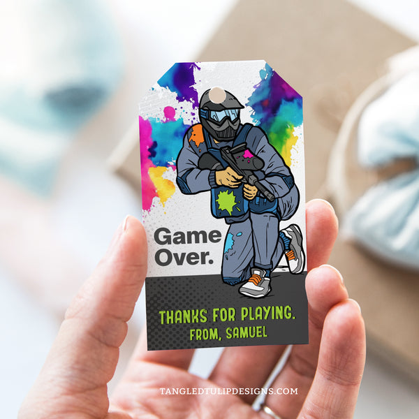 Cool paintball party Thank You tags. Featuring a paintballer covered in splatters, these editable tags are great for adding a personal touch to your paintball birthday party favors. By Tangled Tulip Designs.