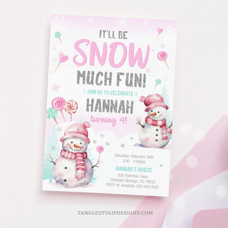 Winter Snow birthday invitation in pink, with a cute snowman and candy lollipops in the snow for a girl's birthday party, with glitter silver snowflakes. Tangled Tulip Designs - Birthday Invitations