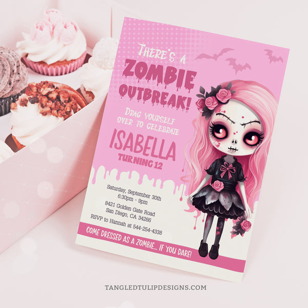Girl Zombie party invitation features a little zombie girl on a pink and cream background with bats flying and spooky drips. Template to Edit in Corjl. By Tangled Tulip Designs.
