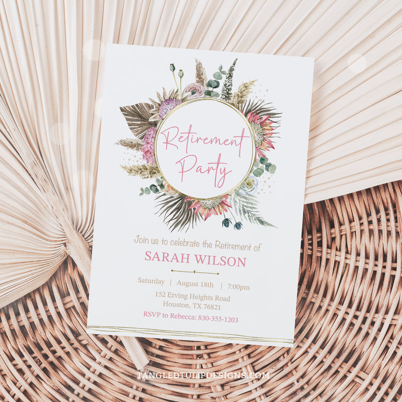 A Retirement Party invitation for a woman in a pretty floral design with a bohemian flair. Featuring a watercolor floral wreath with proteas, adorned with elegant gold accents. By Tangled Tulip Designs.