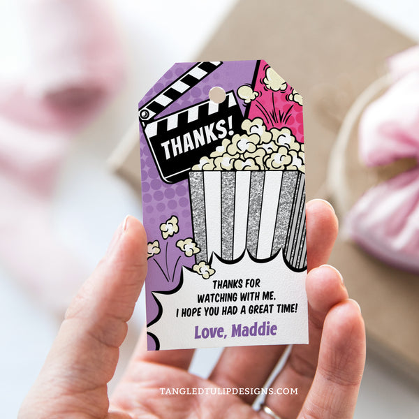 Editable movie party Thank You tags with a comic style design, in purple, hot pink, and glitter silver. Add a personal touch to your movie party favors. Invitation template to edit in Corjl. By Tangled Tulip Designs