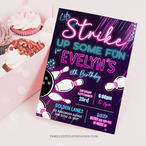 Editable Bowling birthday invitation for girls. Let's Strike Up Some Fun with this glowing bowling party invite. Features a glow in the dark design with bowling ball and pins flying everywhere! Tangled Tulip Designs - Birthday Invitations