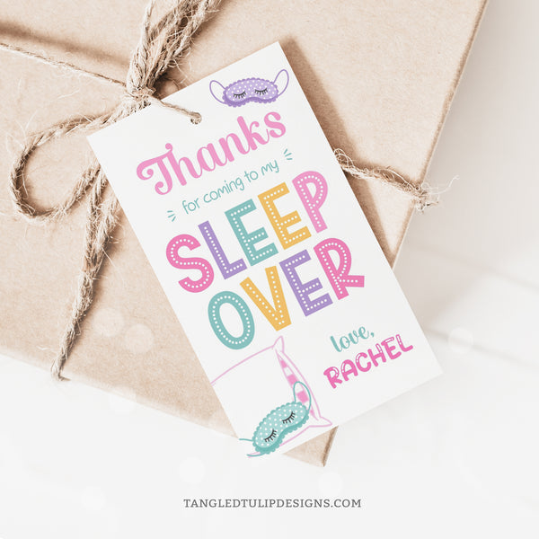 Thank your guests with these adorable Sleepover Party favor tags, in a delightful pastel color scheme, with a big fluffy pillow and eye mask. Perfect for a girl's slumber party. Tangled Tulip Designs - Birthday Decorations