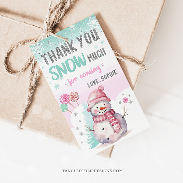 Thank your guests with our adorable Winter Snowman Birthday Thank You Tags! Featuring a charming snowman and lollipops nestled in the snow, these editable tags are perfect for adding a touch of pink and silver sparkle to your birthday party favors. Instant Download and Editable in Corjl. By Tangled Tulip Designs.