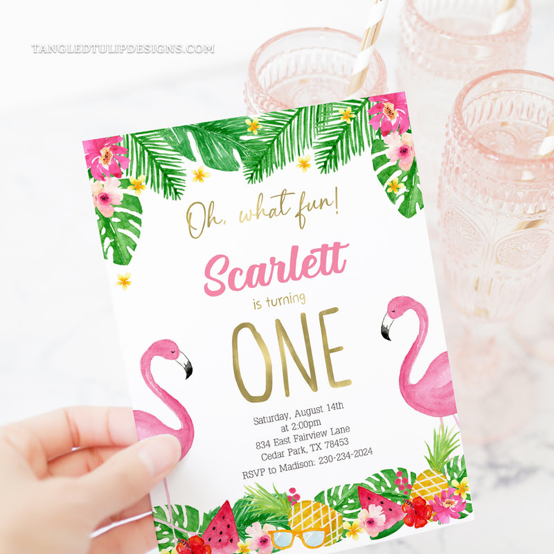 Flamingo first birthday invitation in a tropical theme, with pink flamingos and tropical fruits, flowers and leaves. Oh, What Fun it is turning One! Tangled Tulip Designs - Birthday Invitations