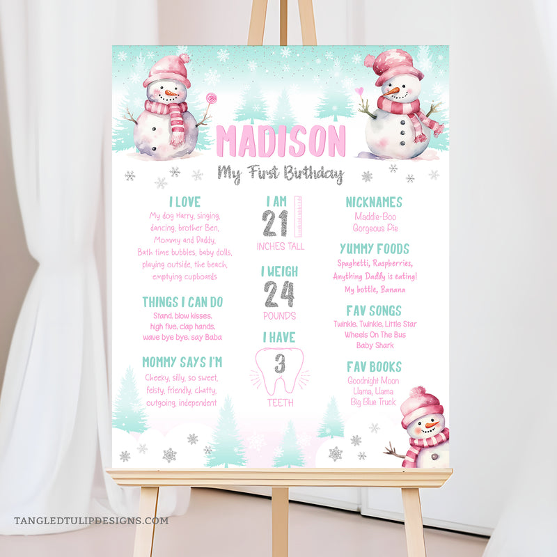 An editable Winter ONEderland First Birthday Milestone Poster in a pretty Winter theme, with cute snowmen in the snow. Perfect for Winter theme 1st birthday decorations. Instant Download and Editable in Corjl. By Tangled Tulip Designs.