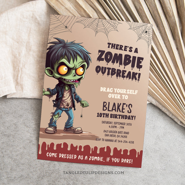 There's a Zombie Outbreak! This zombie birthday invitation template features a gruesome little zombie and spooky spiderwebs, calling zombies to drag themselves over to the celebrate.  Template to Edit in Corjl. By Tangled Tulip Designs.